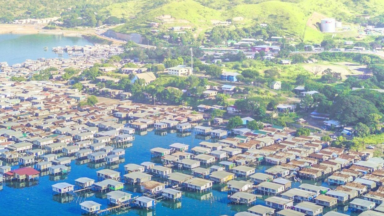 Aerial view of Port Moresby harbour, Hanuabada and the hills beyond