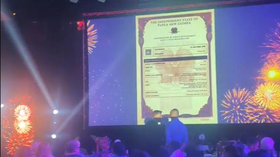 The first strata development lease e-title shown on screen at its launch in Port Moresby, March 2026