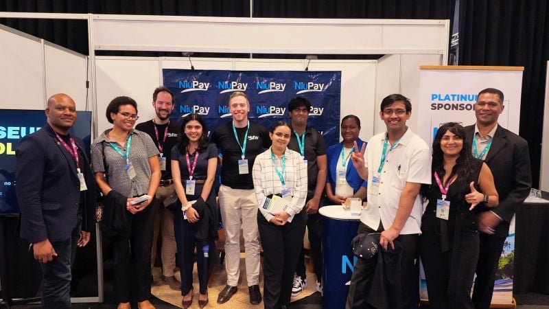 NiuPay team members and student interns at the NiuPay stand at the Pacific Fiber Conference 2026 in Nadi