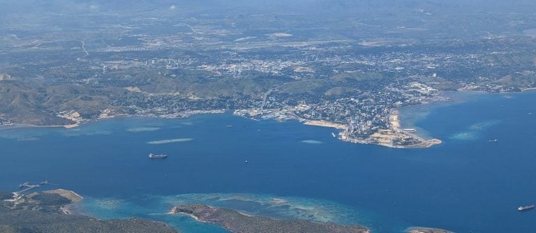 Port Moresby from the air, with reefs and islands in the foreground